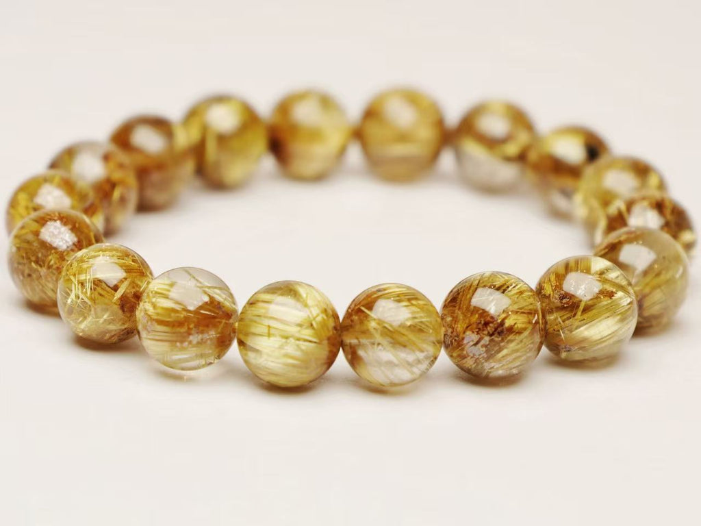 12mm Golden Rutilated Quartz Bracelet - Stone of Abundance & Manifestation - wellspringcollectives